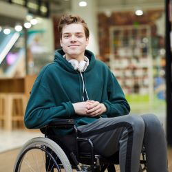 Guy in Library Uses Wheelchair